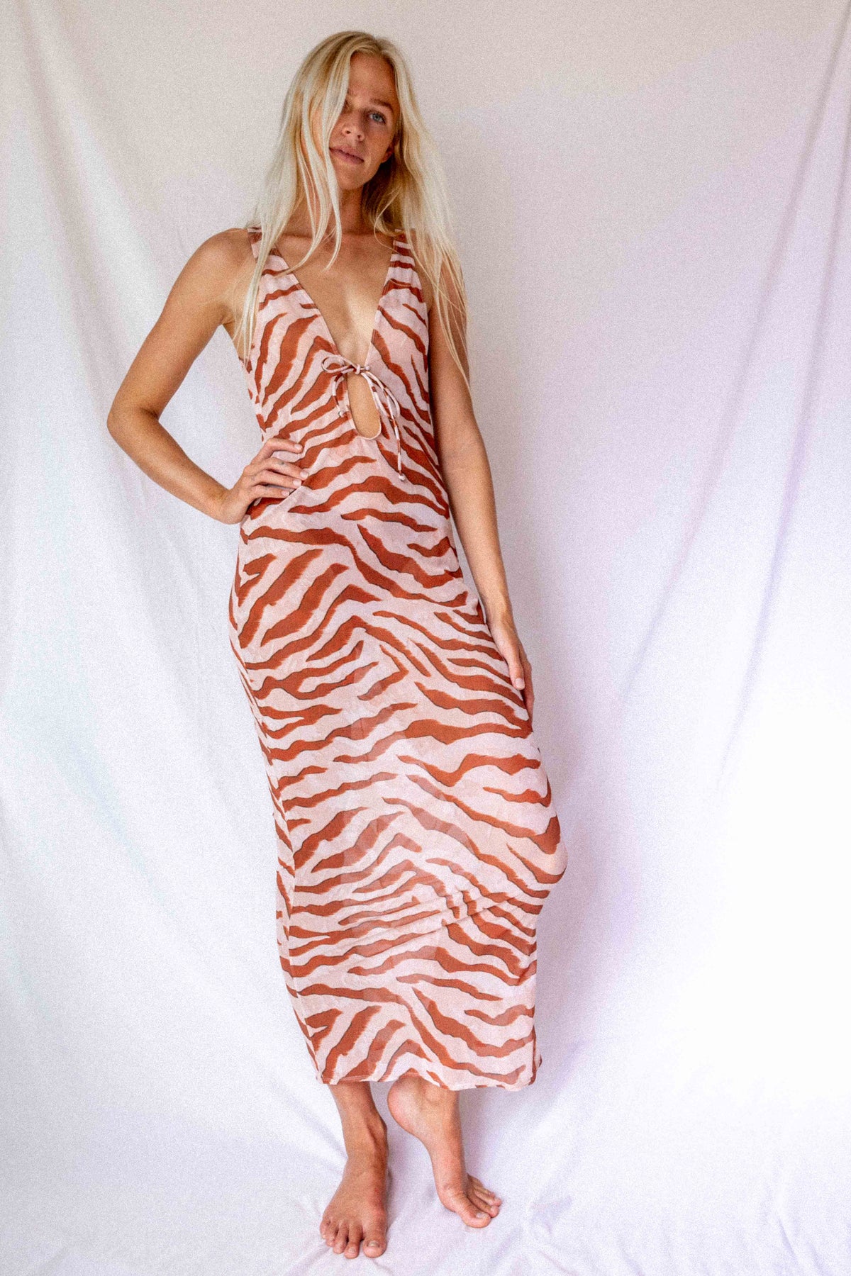 Maxi Dress in Dune animal print, full-length front view showing keyhole tie neckline and elongated silhouette by Antidote The Label