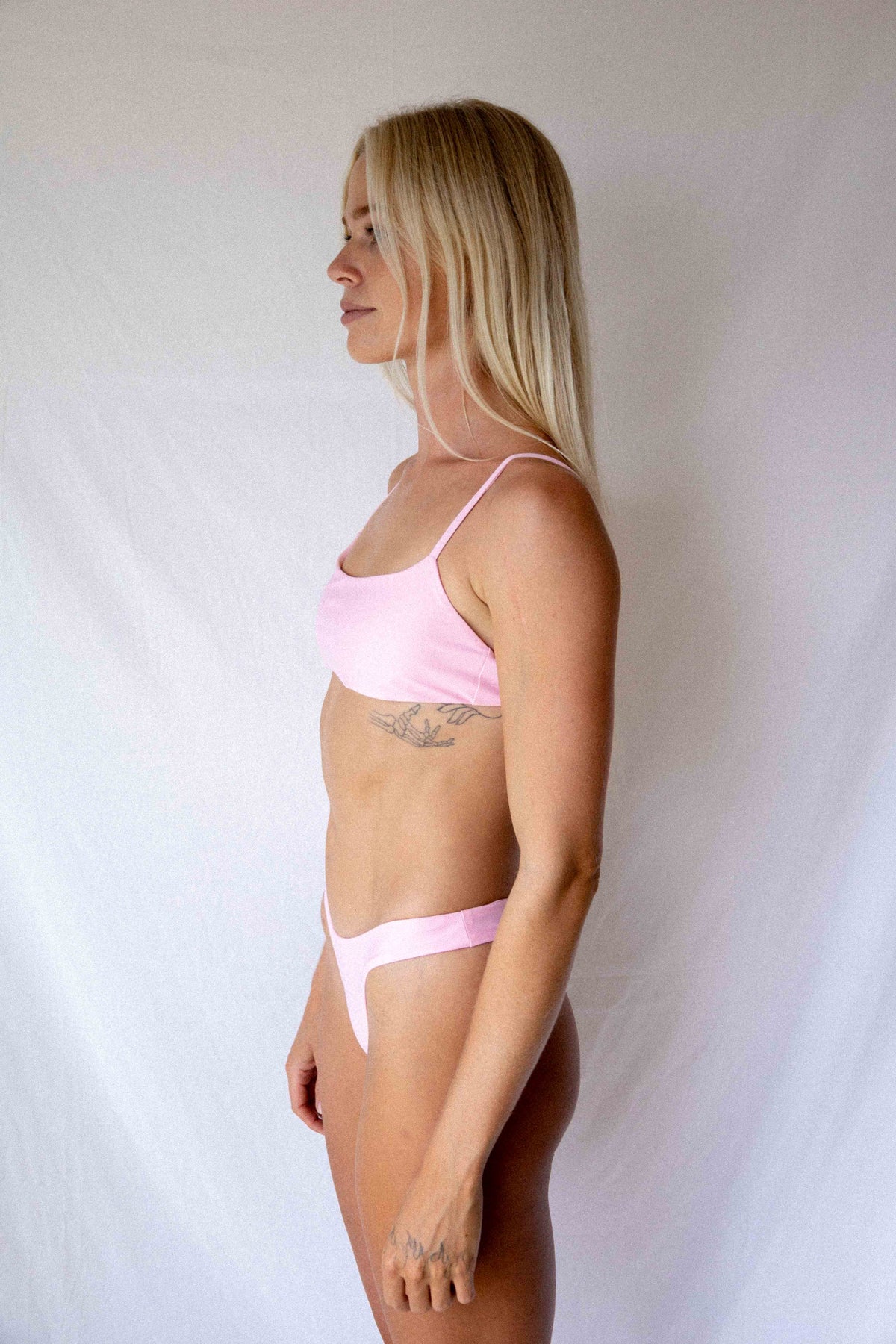 Ona Surf Bikini Top Blush, side view surf-ready fit