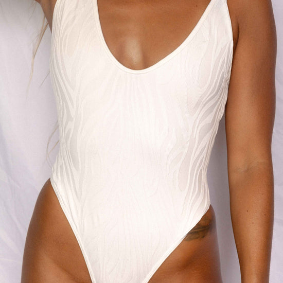 Zoe One Piece in Ivory, front torso view showing sculpting fit, scoop neckline, and cheeky cut